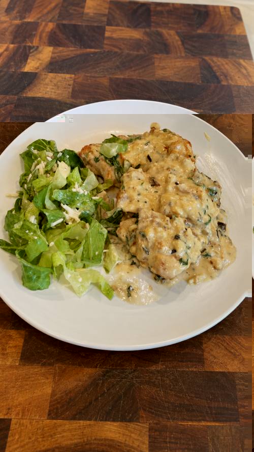Chicken au poivre with creamy pan sauce and side salad